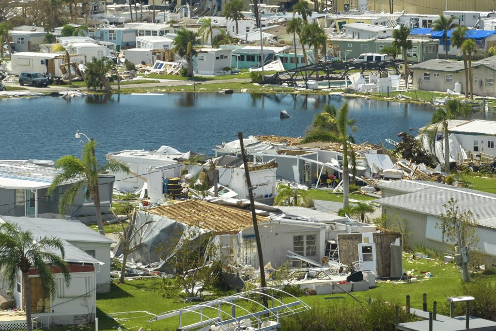 Hurricane Milton destroyed homes in Florida residential area. Natural disaster and its consequences